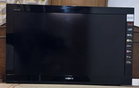 This is a 32-inch Sony BRAVIA LCD TV. The screen is damaged, but all
