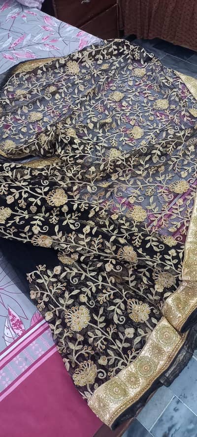 Black amd golden heavy embroidery formal saree