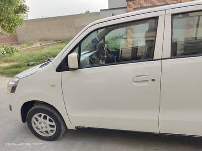 Suzuki Wagon R VXL 2018 white color for sale 0 3 0 2 7 1 4 1 5 2 3