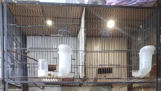 Bird cage double with partition in good condition.