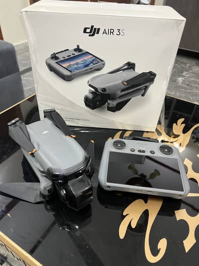 DJI Air 3 Fly More Combo with RC 2 controller and charging hub.
