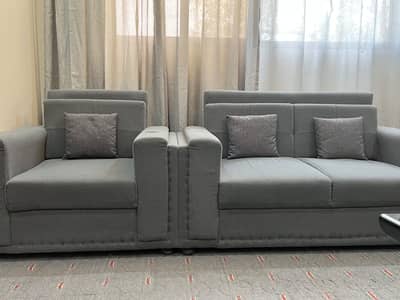 Seven seater sofa set with carpet