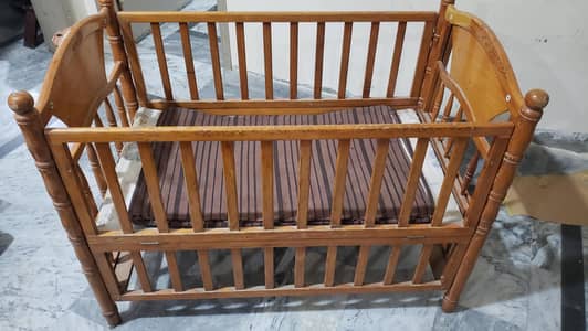 Wooden baby cot for sale urgently