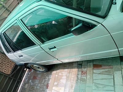Suzuki Mehran VX 2007 total orgnal hn 38000 hzr km chali hn 1 owner ac