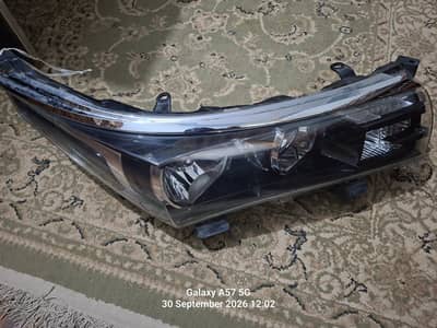 Toyota corolla headlight assembly-Genuine/orginal