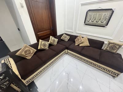 L shape Versace brown colour sofa