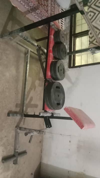 Dumbbell plates and press bench and rods for urgent sale.
