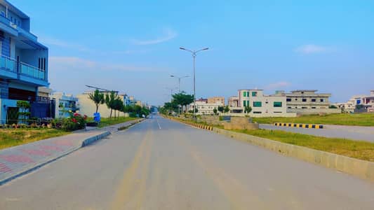 UNIVERSITY TOWN BLOCK E SIZE 5 MARLA PLOT FOR SALE ON GOOD LOCATION FIRST COME FIRST AVIL THIS BIG OPERTUINTY