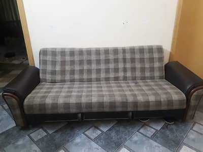 sofa cum bed made of leather and fabric poshish