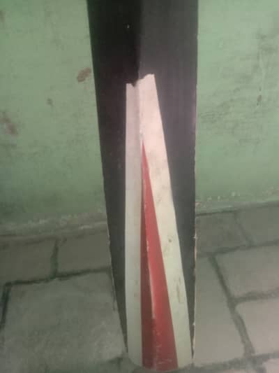 Tape ball wood bat