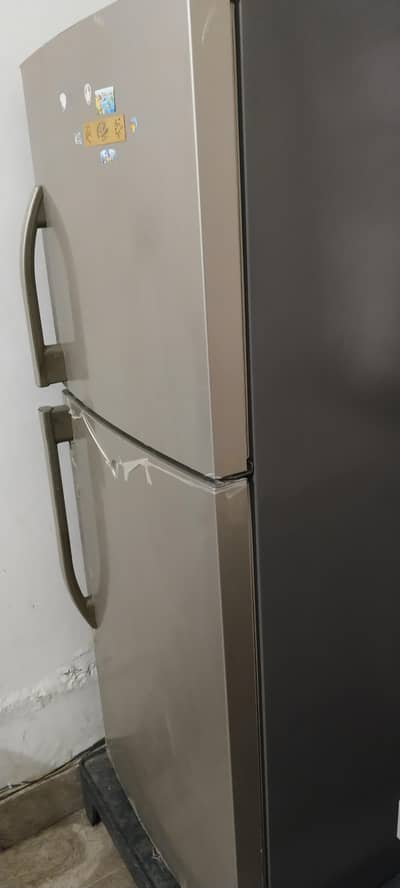 Haier fridge medium size good condition location Gujrat city