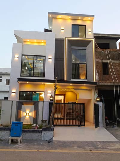 FOR SALE - 5 Marla Beautiful House in Faisal Town Block A* *Location:* Faisal Town Block c - Prime Location