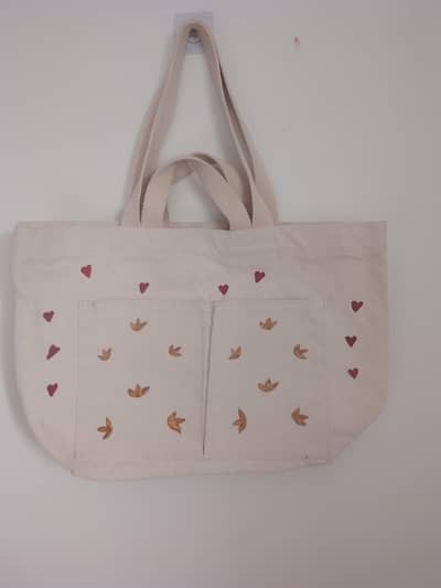Customize printed & hand painted bags & pouches.