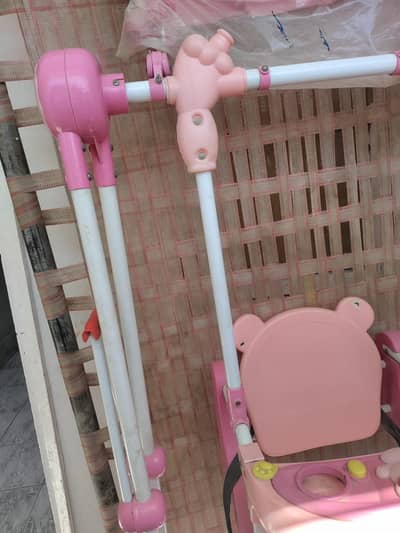baby swing pink in colour