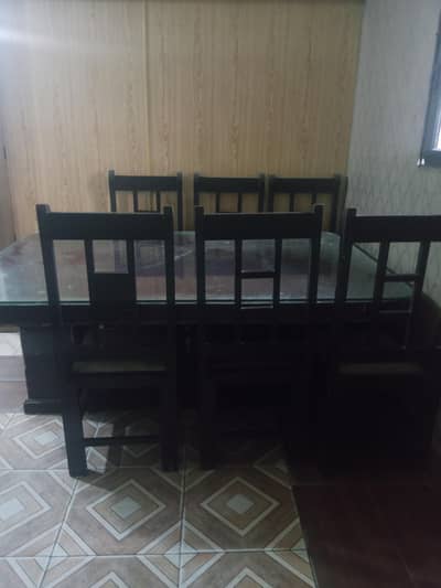 Dining Table with 6 Wooden Chairs & Glass Top – Good Condition