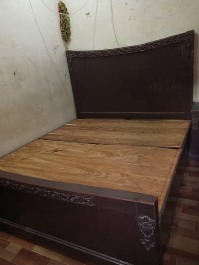 Bed , Dressing table and showcase .  made up of quality wood
