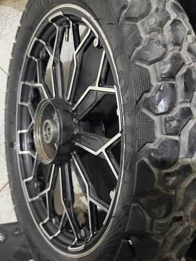 Alloy rims and tube less tyres 125
