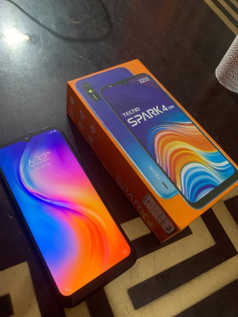 Tecno Spark 4 Lite 6