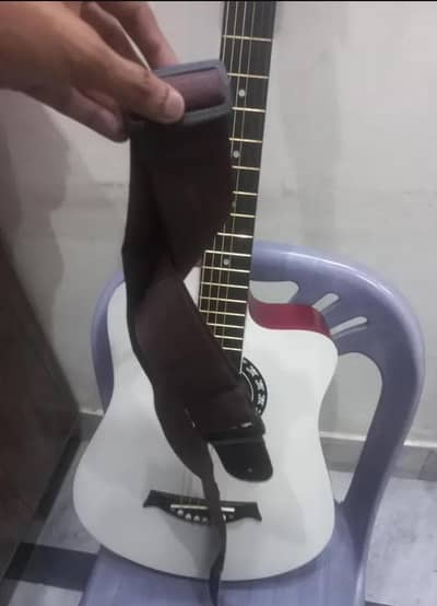 acoustic guitar with bag and strap and picks with 2 pack of strings