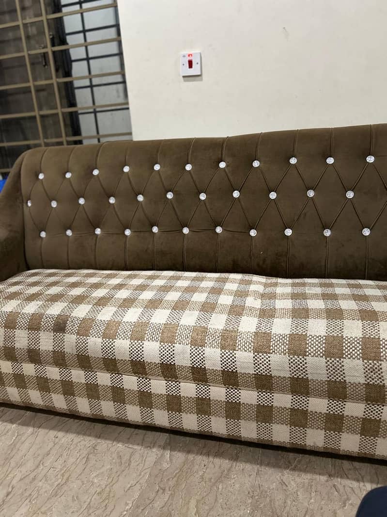 Brown sofa. 1
