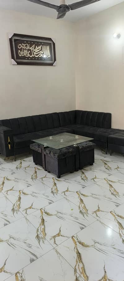 7 seater L shape sofa with Extra Puffy and 4 stole + table