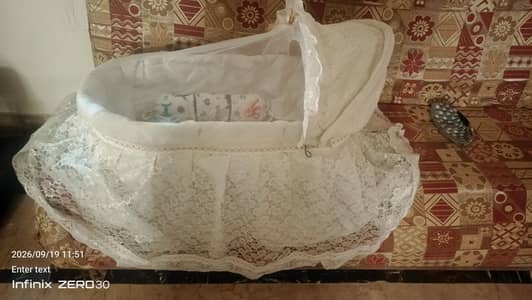 Baby cot with mosquito net