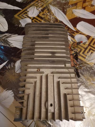 Bose 7 channel amplifier and  2 speakers