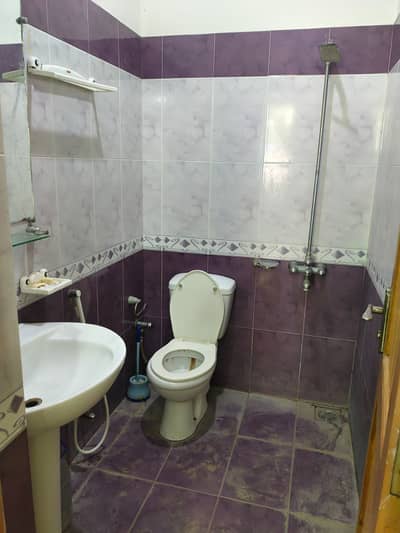10marla 3beds DD TV lounge kitchen attached baths neat clean ground portion for rent in G 13 1 islamabad