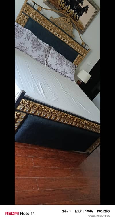 Iron king size bed with side tables