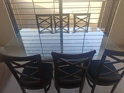 Glass table and 6 chairs