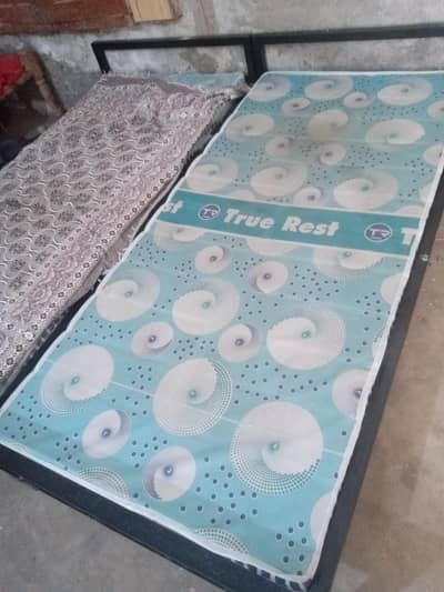 single iron bed with medicated mattress