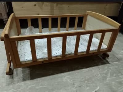 Baby wooden cot in good condition