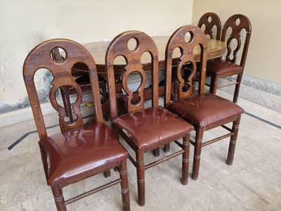Pure wooden dining table with 6 chair lather poshish conditions 10/10