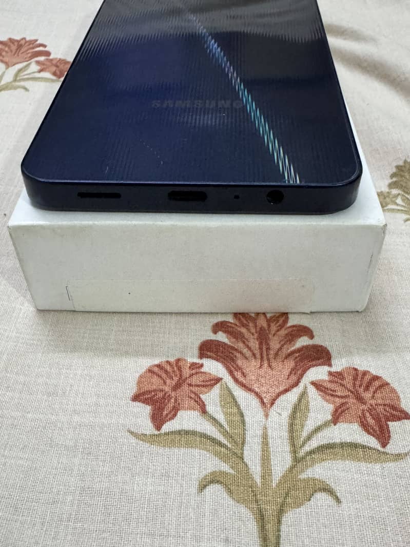 Samsung Mobile A06 3
