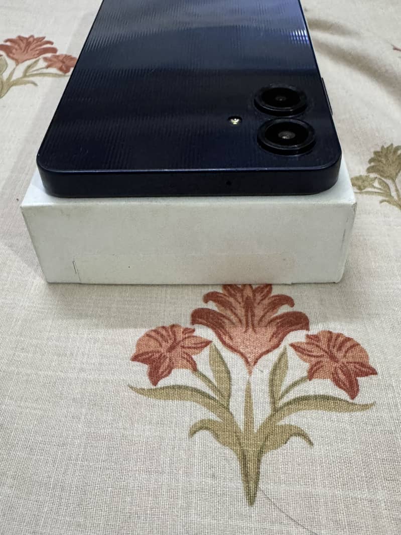 Samsung Mobile A06 5