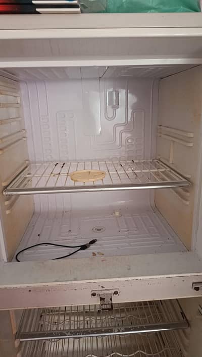 "Used refrigerator for sale in excellent and working condition" اگر