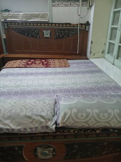 one bed  with out matressan  one sofa three siter and three table set