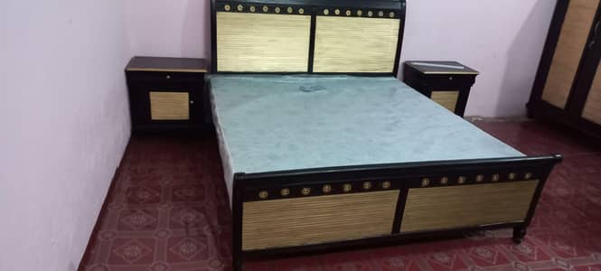 full sized bed , cupboard, dressing table, side tables, iron table