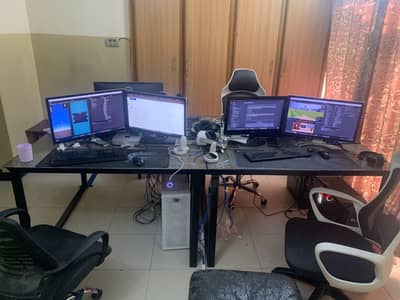 2 office tables 4x4 with power outlet