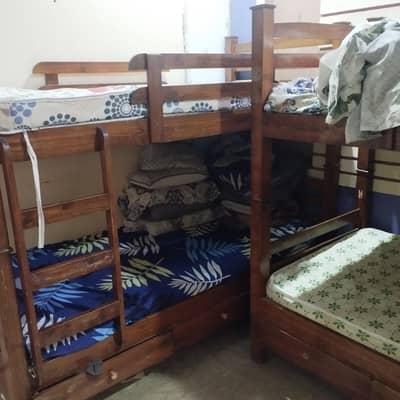 wooden bunk bed with mattress included