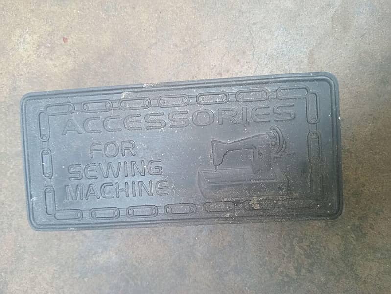 Sewing machine 12