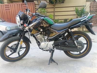 YBR 125 G - Total Genuine