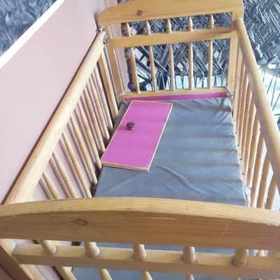 wooden baby bed