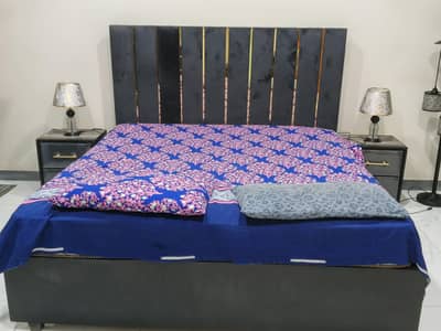 Bed with side tables ,sliding cupboard,dressing table