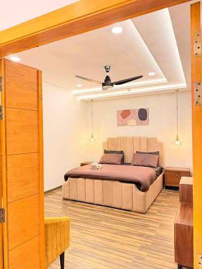 Daily Basis Apartment & Rooms Per day Perweek Short stay Available in E-11 Islamabad
