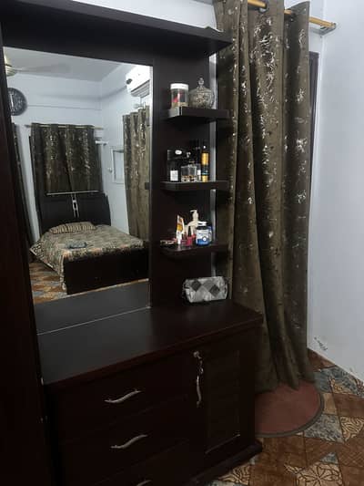 bed with new mattress, dresser and cupboard