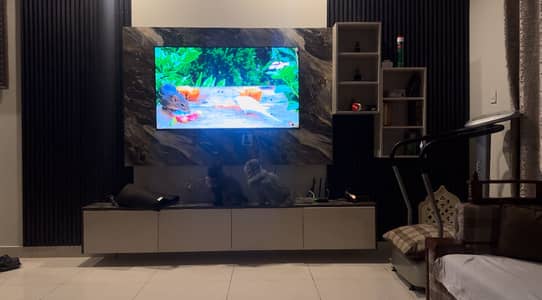 Media wall with plenty of storage of drawers good wuality