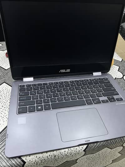 ASUS LAPTOP THAT TURNS INTO TABLET