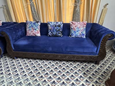 7 Seater Sofa Set in Brand New Condition with extra cushion covers.