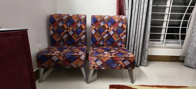 2 single seater sofas
